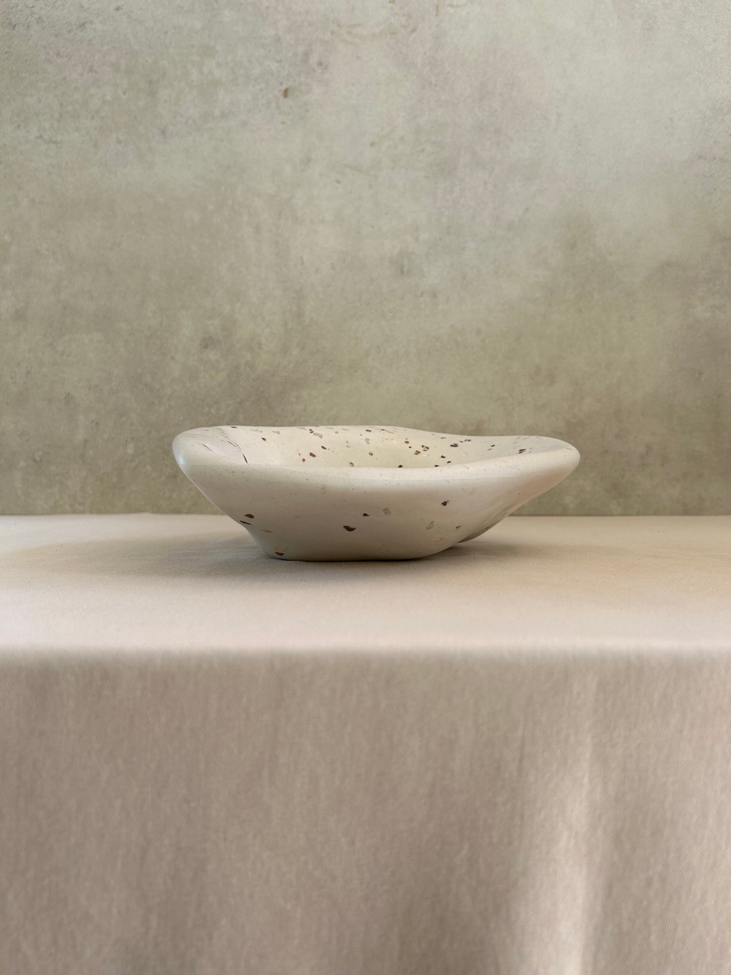 Dune Salad Bowl, handmade with brown terrazzo chips, Eid Edit series, elevation view.