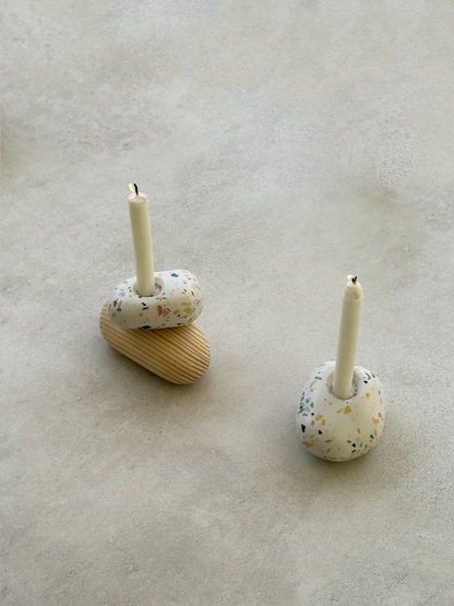 A pair of handmade Pebble Candlestands. Crafted using wood and terrazzo. 2