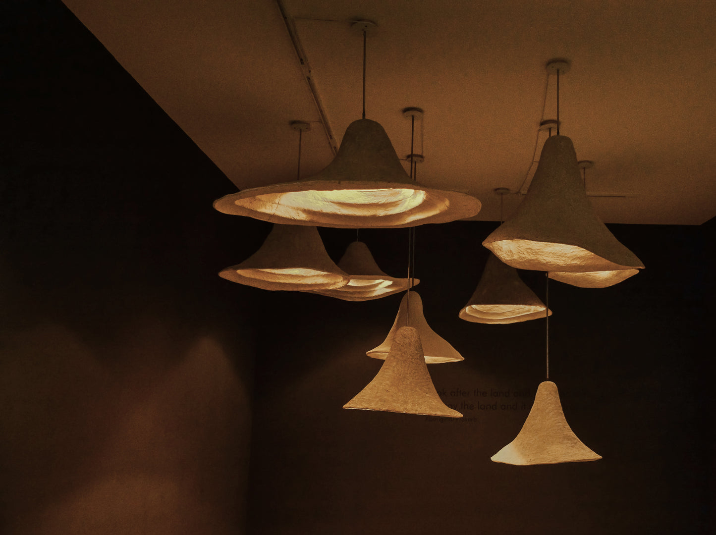Handcrafted Papercrete Floats installed in a client's space.