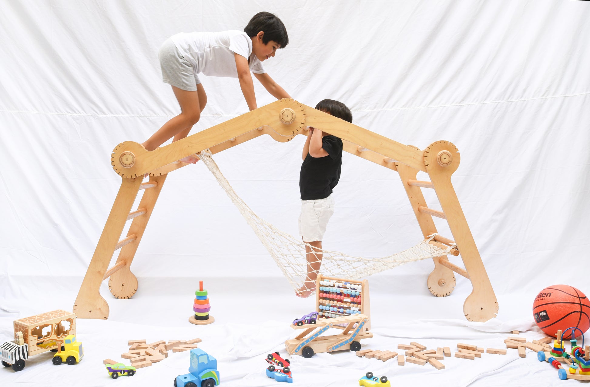 One view of the Pikler, a modular triangular climbing frame for children.