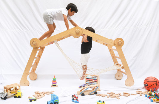 One view of the Pikler, a modular triangular climbing frame for children.