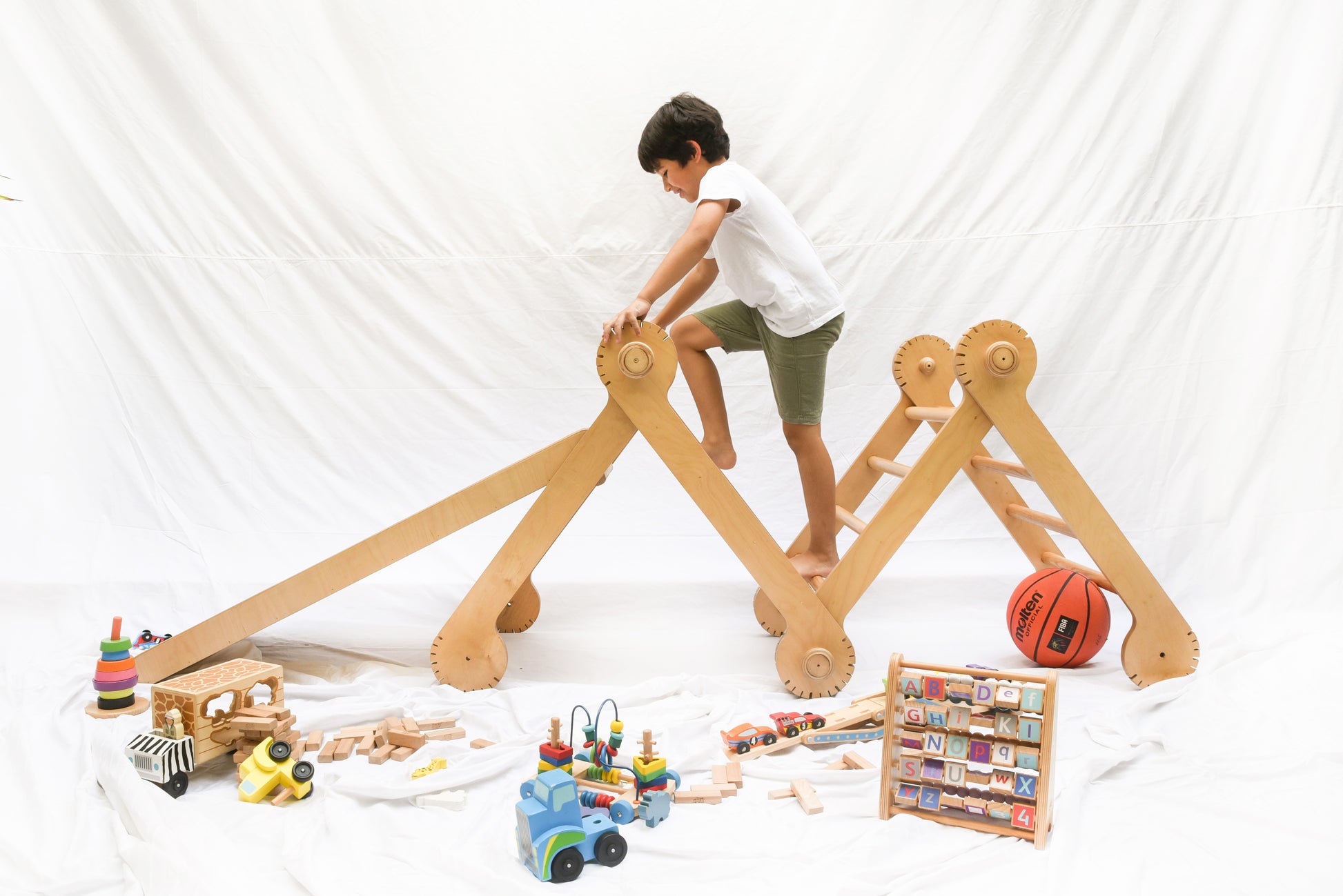 One view of the Pikler, a modular triangular climbing frame for children.3